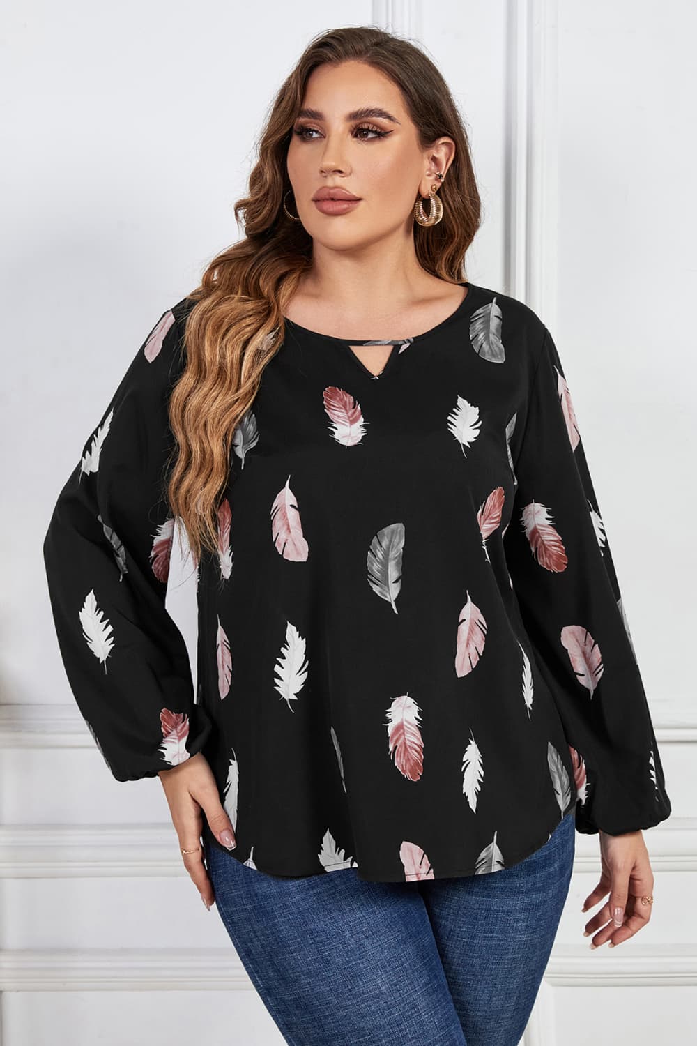 Melo Apparel Plus Size Printed Round Neck Long Sleeve Cutout Blouse